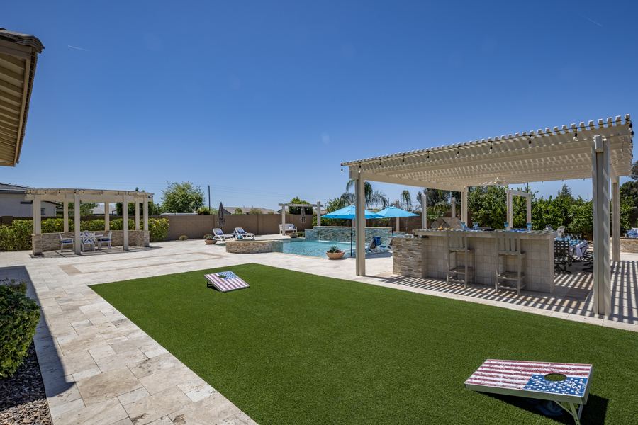 Turf lawn with pergola bar and yard games, Family Focused in Gilbert, AZ