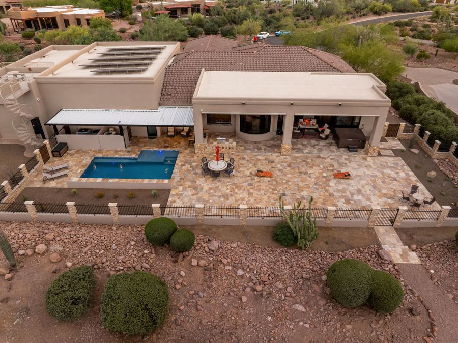 Aerial view of the pool and travertine patio