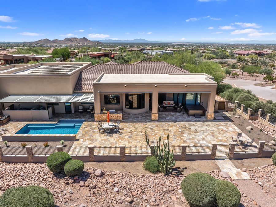 Aerial of the pool and patio along the back of the house