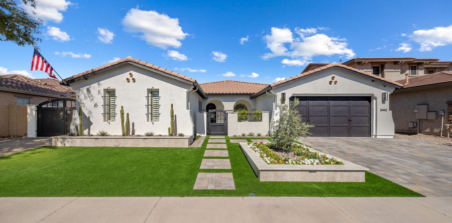 Refreshed front yard with turf and planters