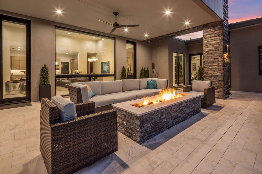 Linear fire table under the covered patio