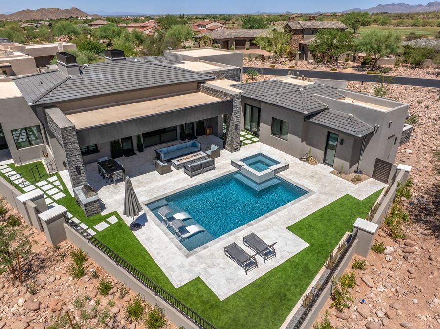 Aerial view of the pool, spa and turf